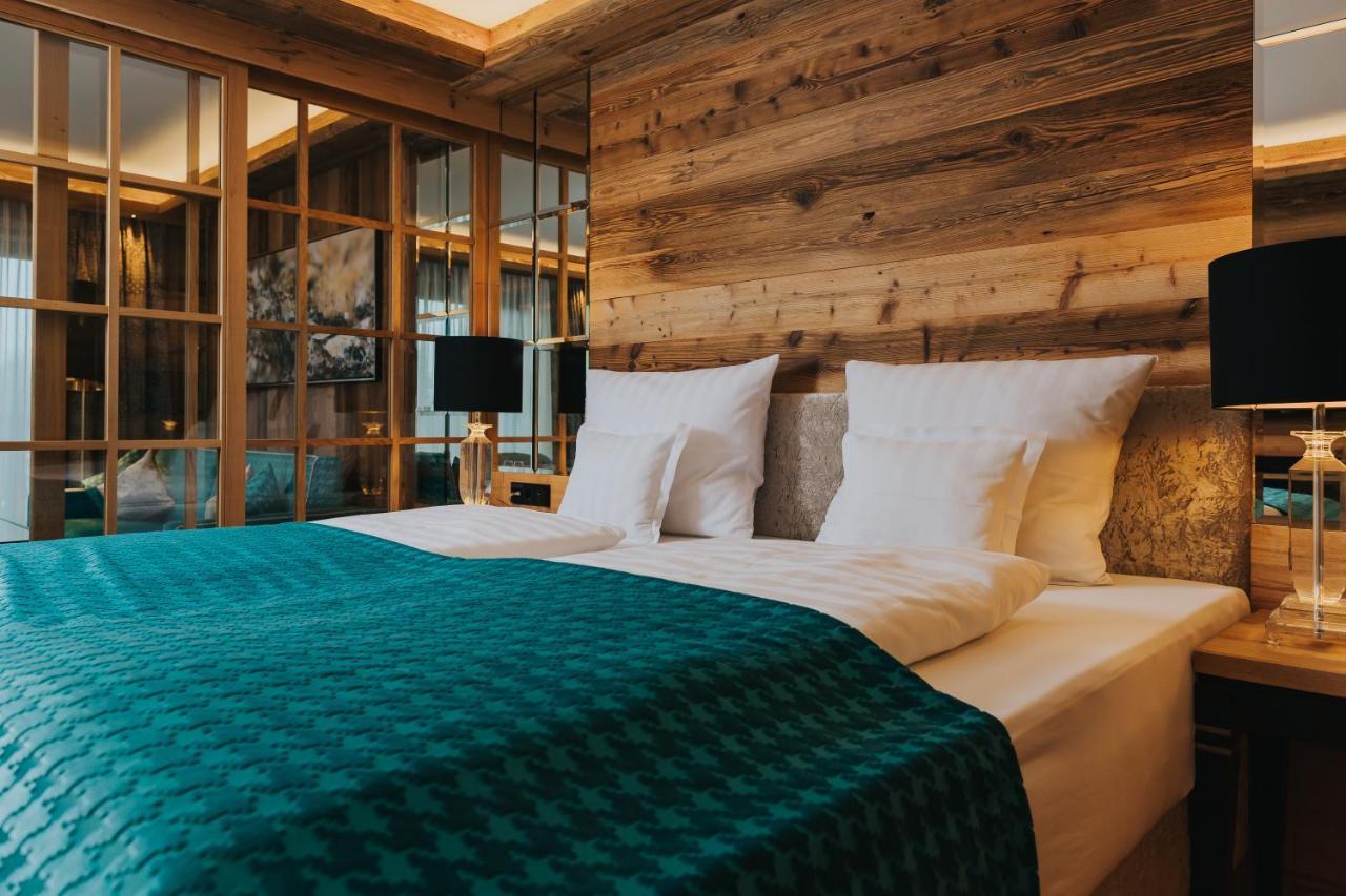 Ortner'S Resort 바트푸징 외부 사진 A bedroom at the Hotel de la Poste